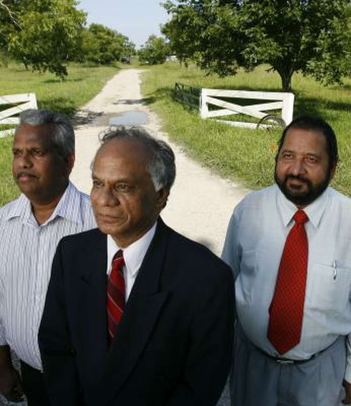 Somarajan Nair, left, Sam Kannappan, center, and Sasidharan Nair plan to build an independent- and assisted-living community in Pearland.