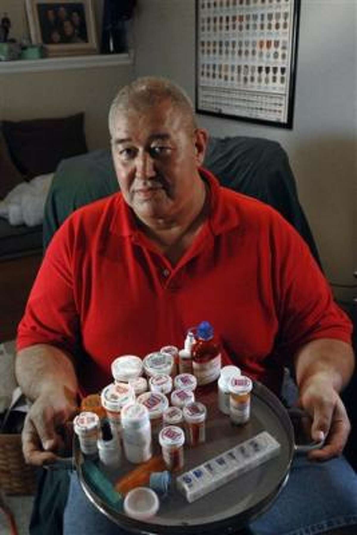 Retired Marine Staff Sgt. James Fernandez, 54, of Fredericksburg, Va., takes the equivalent of nine painkillers containing oxycodone every day.