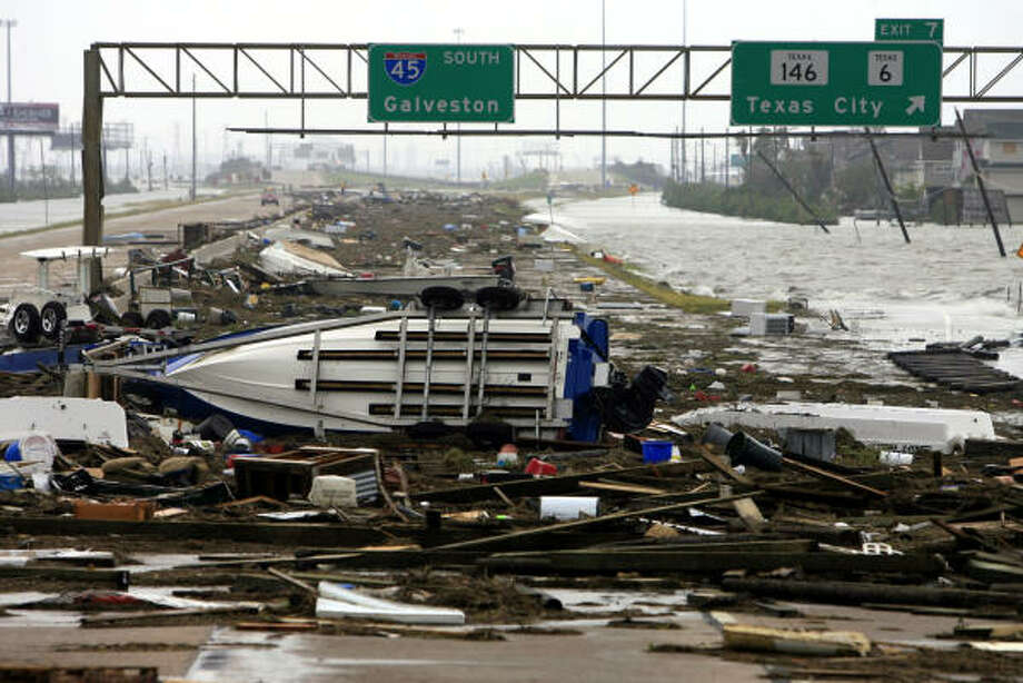 Roadblocks | Debris covers the southbound lanes of Interstate 45. | Sept. 13 | La Marque Photo: Eric Kayne, Houston Chronicle