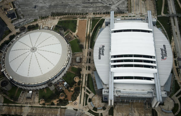 An aerial view of NRG Stadium and Astrodome, Sunday, May 30, 2021, in  Houston. NRG Stadium is the home of the Houston Texans. The Astrodome  served as the home of the Houston