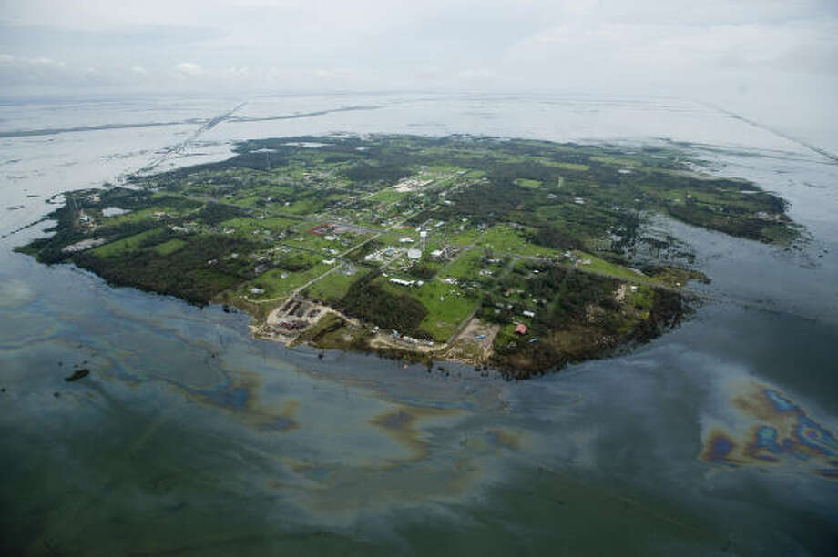 Living up to its name | Water washes out roads heading into High Island. | Sept. 14 | High Island Photo: Smiley N. Pool, Houston Chronicle