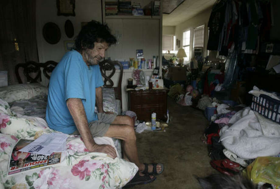 Stranded | Bill Smith, who said he had neither the money nor a car to be able to leave, ducked under the radar of security and emergency personnel and rode out the hurricane in a friendÕs home. | Sept. 14 | Surfside Beach Photo: Julio Cortez, Chronicle