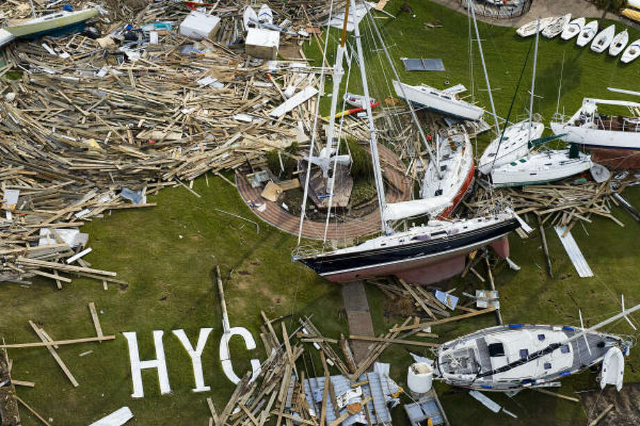 Costly damage | All manner of sailboats and debris are strewn about the Houston Yacht Club. | Sept. 16 | Shoreacres Photo: Smiley N. Pool, Houston Chronicle