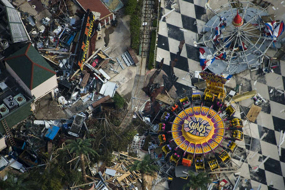 Aptly named | Amusement rides mingle with debris on the Boardwalk. | Sept. 15 | Kemah Photo: Smiley N. Pool, Houston Chronicle