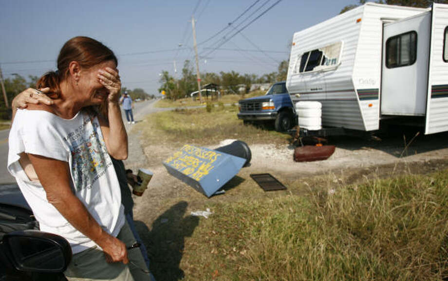 Emotions | Elizabeth Jones weeps about a friend who has been missing since the storm. "I'm scared to call his mother because I don't know where he is or what happened to him," said Jones. | Sept. 19 | San Leon Photo: Sharon Steinmann, Houston Chronicle
