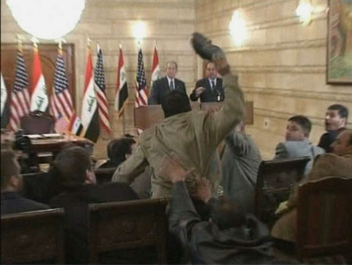 Bush dodges shoes