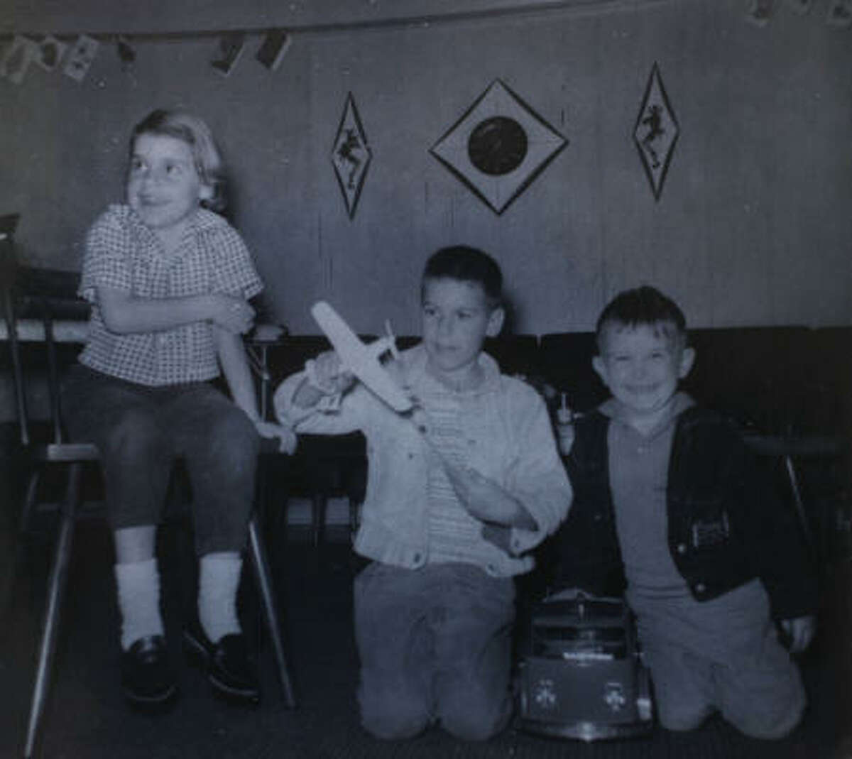 An undated family photo shows Randell Harvey, center, with sister Lenore McNiel, left, and cousin Terry Minter.