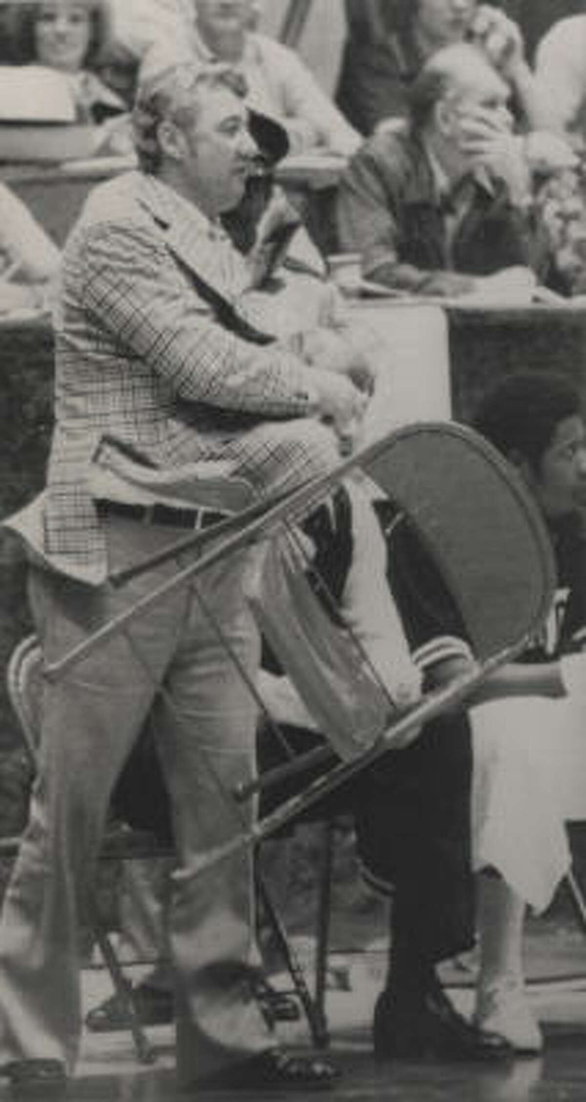 A&M coach Shelby Metcalf displays the fiery side of his colorful personality during a loss to SMU in 1976.