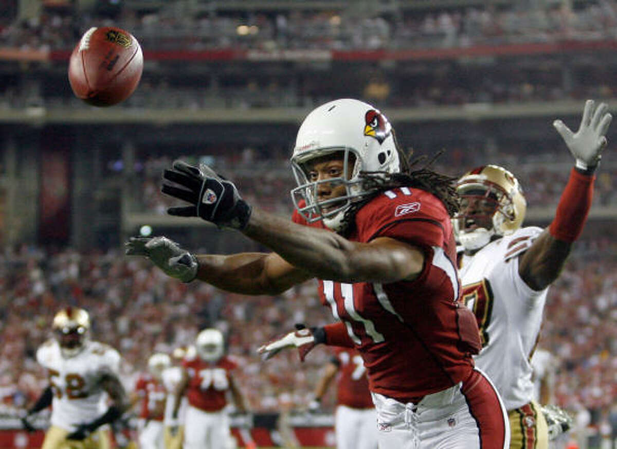 Arizona Cardinals' Larry Fitzgerald (11) is unable to catch the