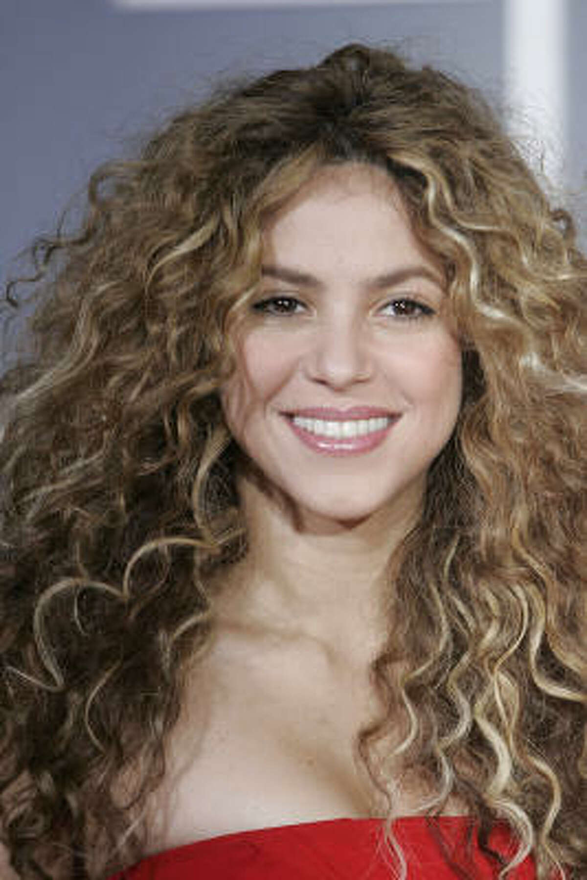 Shakira's highlights shine against a background base color.