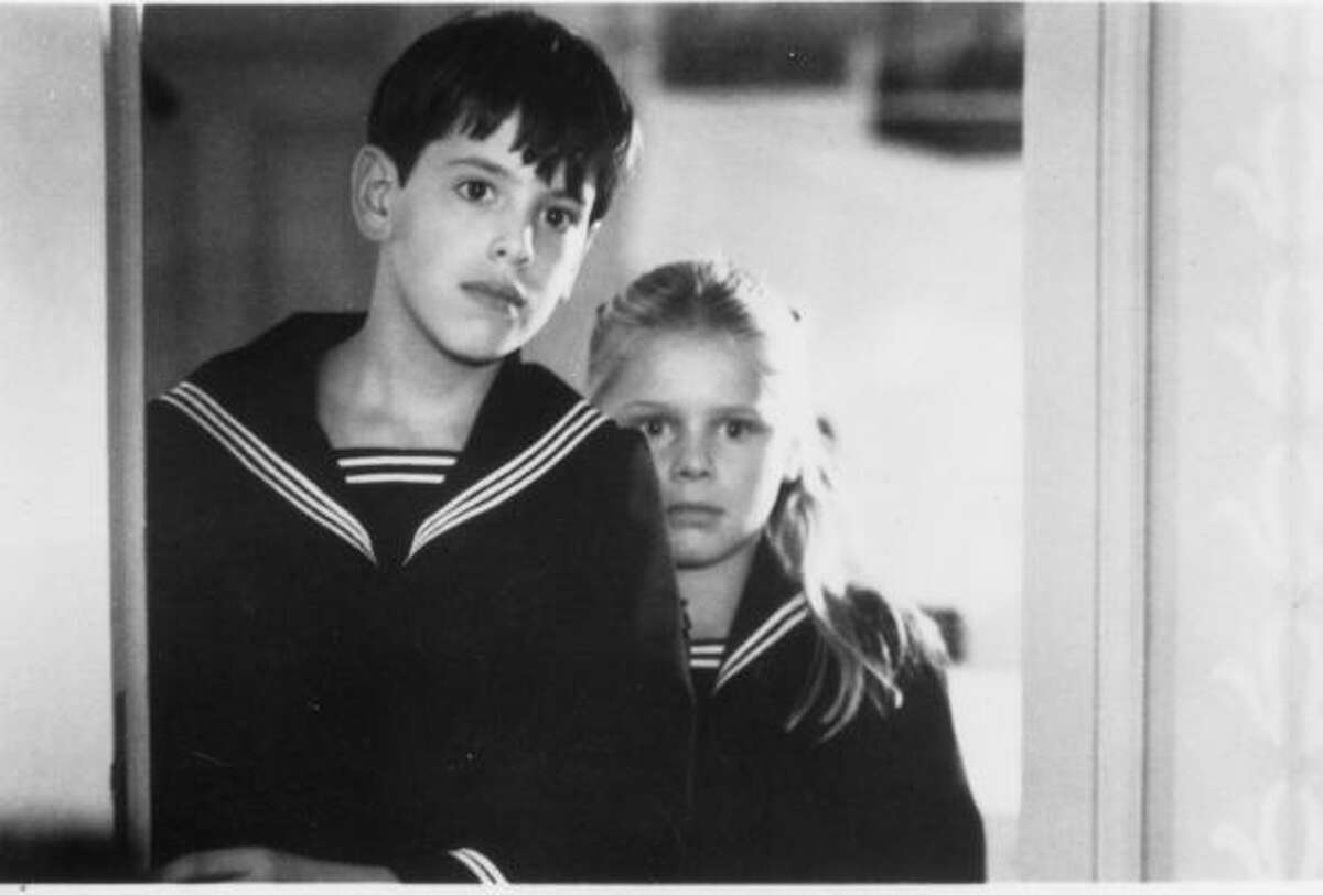 Bertil Guve, left, and Pernilla Allwin starred in Ingmar Bergman's Fanny and Alexander.