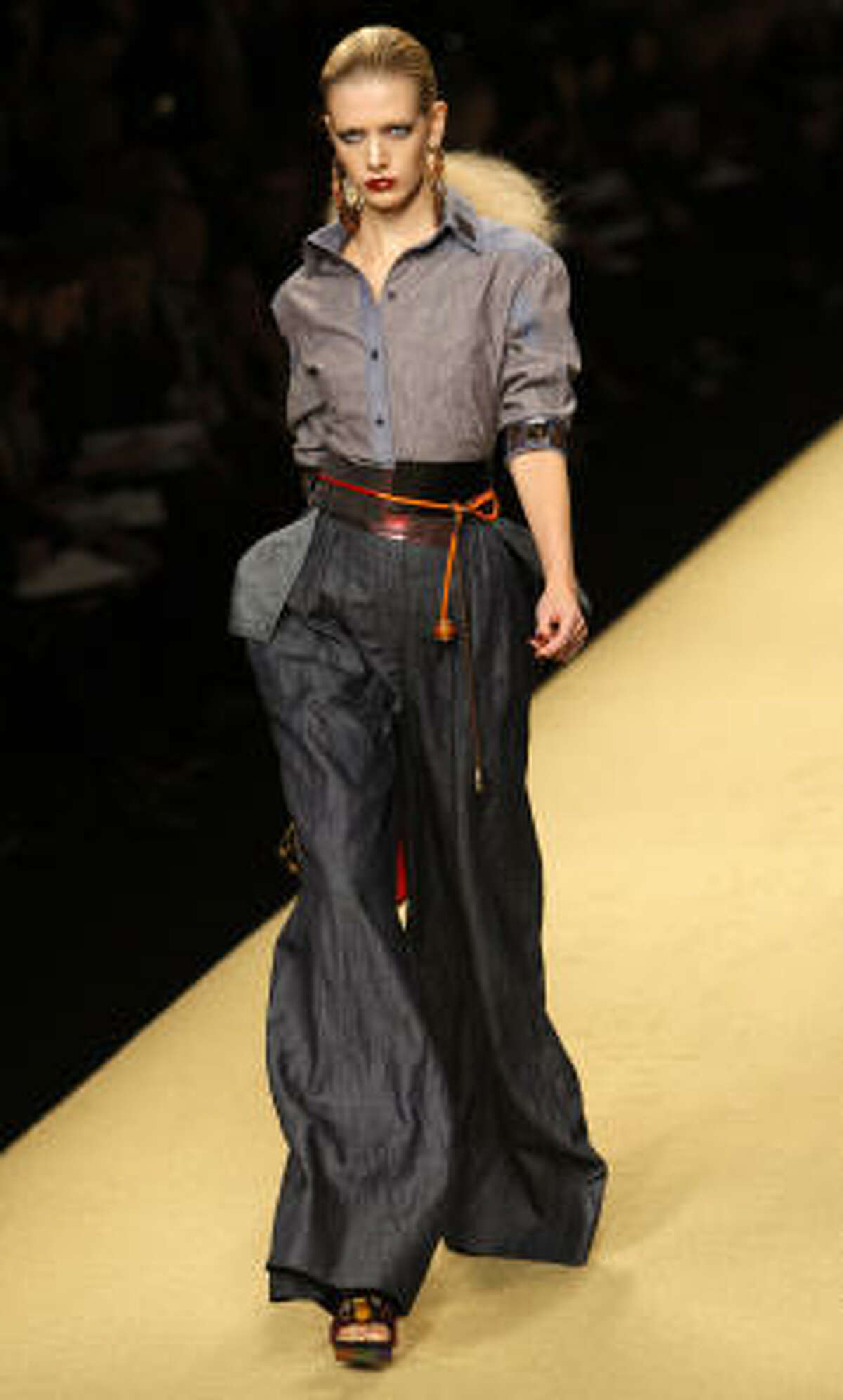 A model wears a creation as part of the Louis Vuitton Ready To