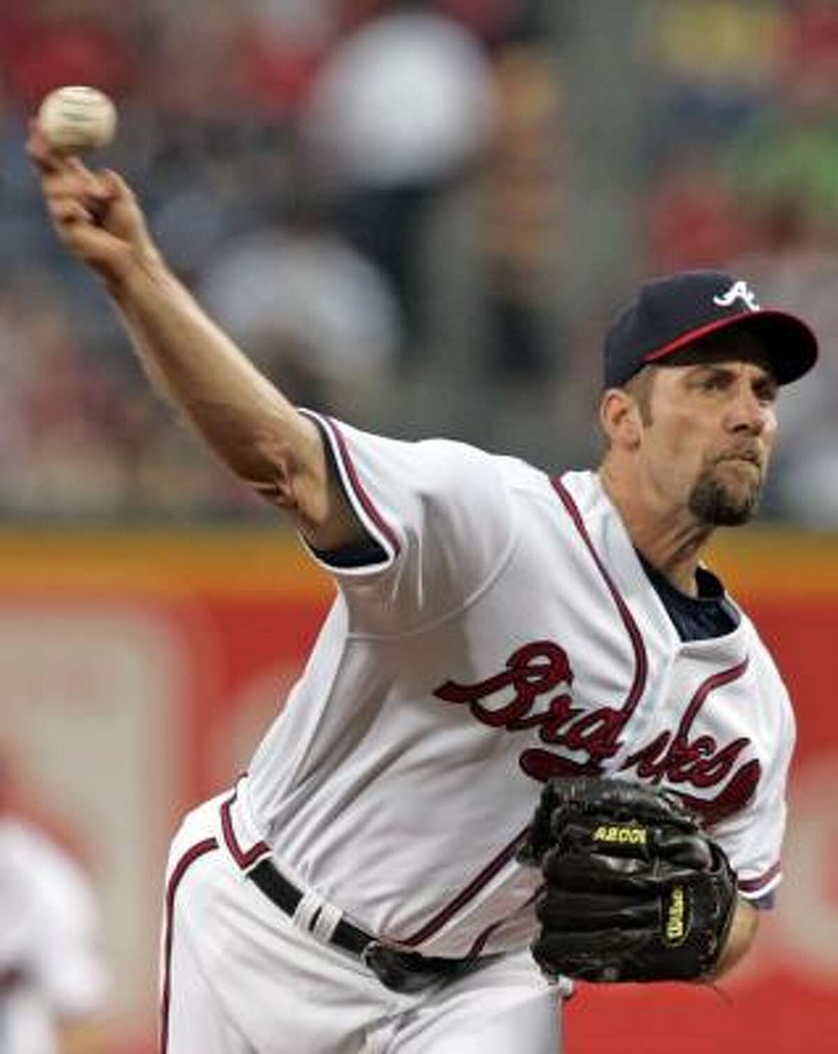 Atlanta's John Smoltz pitched seven strong innings as the Braves shut out Los Angeles 4-0 on Friday night.