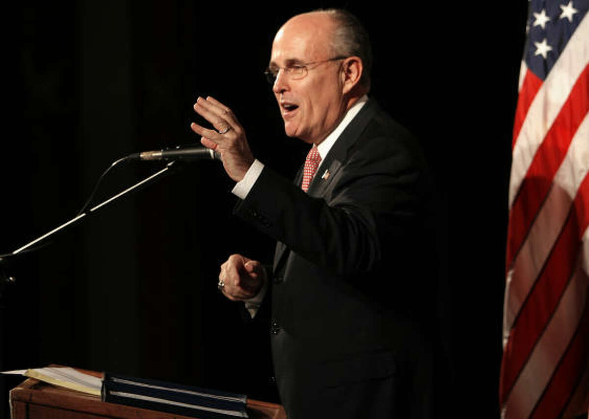 Former New York City mayor Rudy Giuliani speaks at the state's annual Republican meeting in Manchester, N.H., on Saturday. Giuliani was in Houston for a fundraiser Thursday.