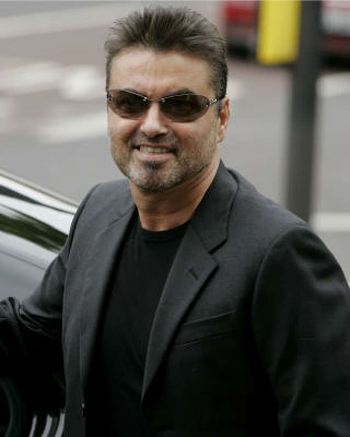 Musician George Michael arrives at Brent magistrates court in London today. Michael, whose real name is George Panayiotou, had pleaded guilty on May 8 to a charge of driving while unfit through drugs.