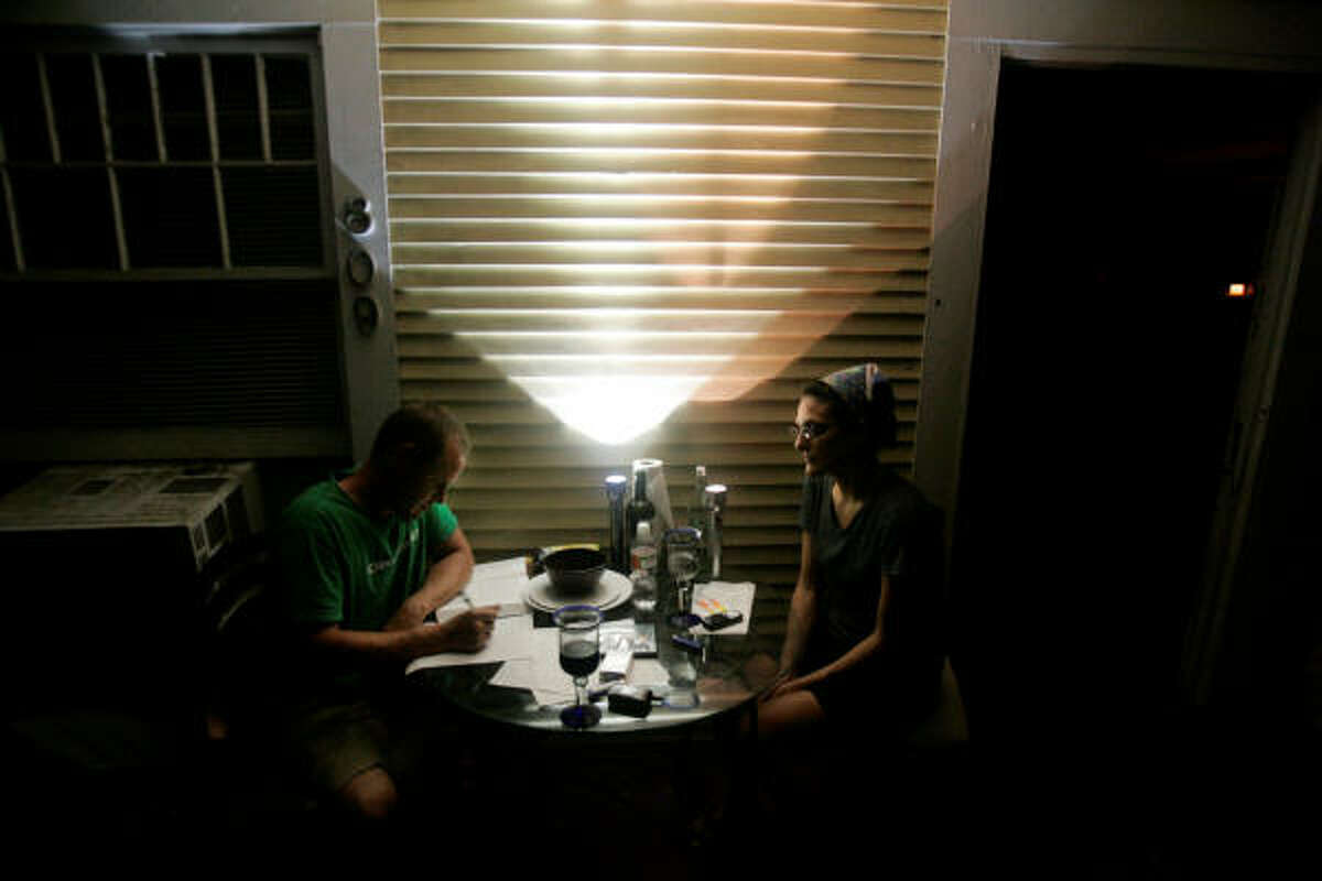 If you need better overall lighting, like this couple, invest in a tabletop oil lamp.