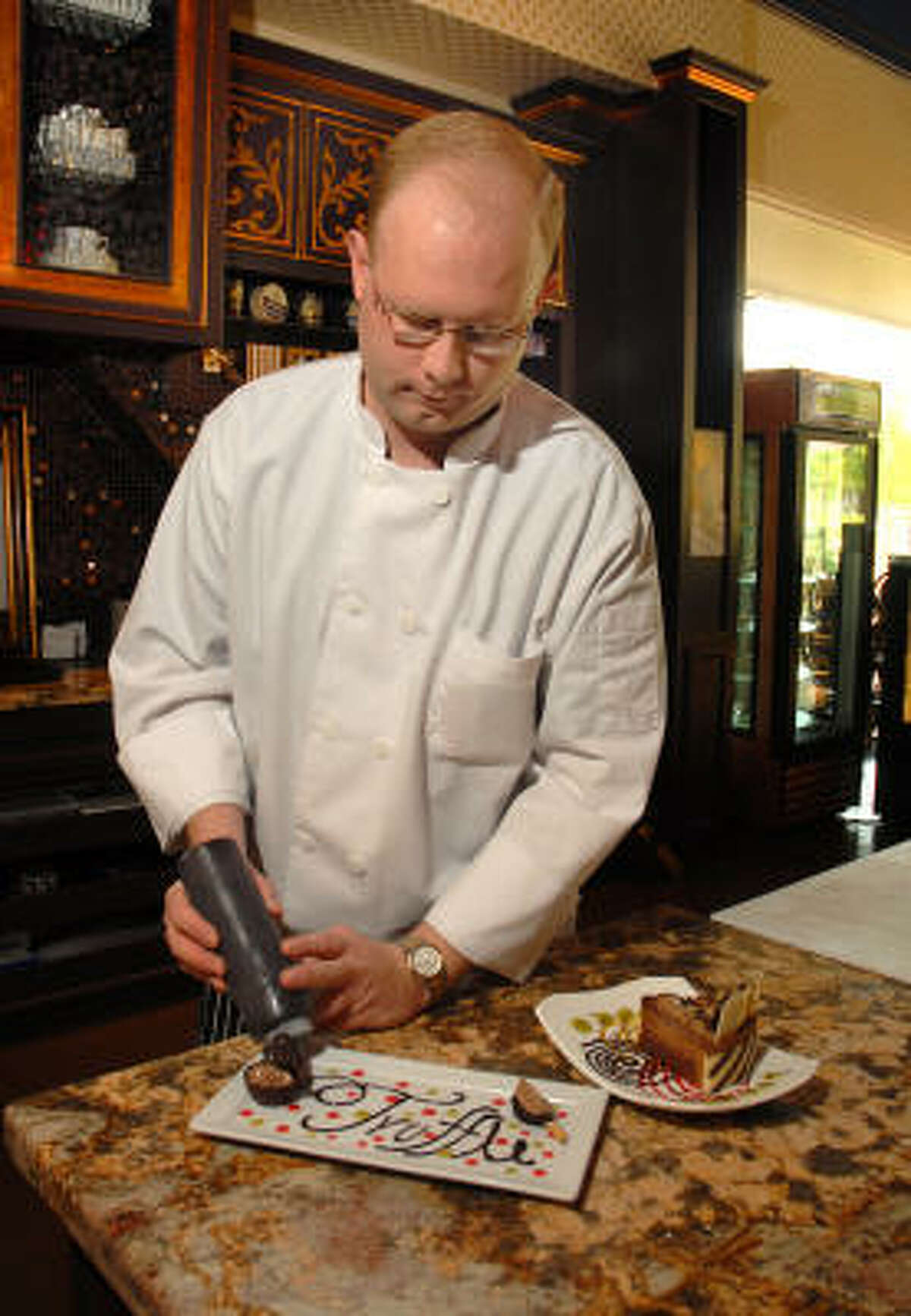 Truffles Chocolate Lounge executive chef Shane Schutte works on a chocolate creation at Truffles in Market Street. He is a partner in the chocolate lounge.