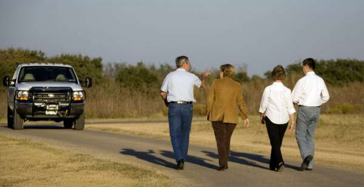President Bush and the first lady entertain German Chancellor Angela Merkel, second from left, and her husband, Dr. Joachim Sauer, at his Crawford ranch.