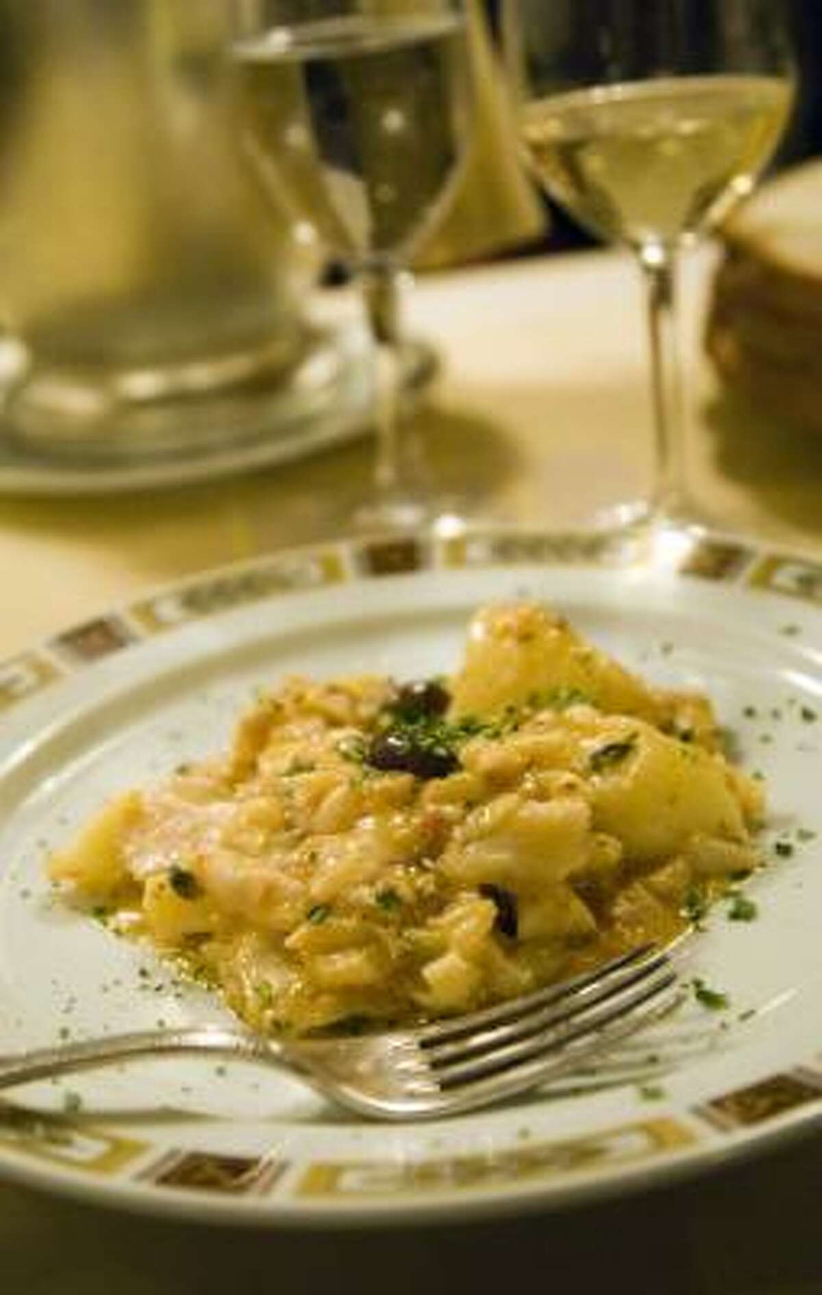 Traditional Genovese cuisine is a house specialty at Taverna Giulia.