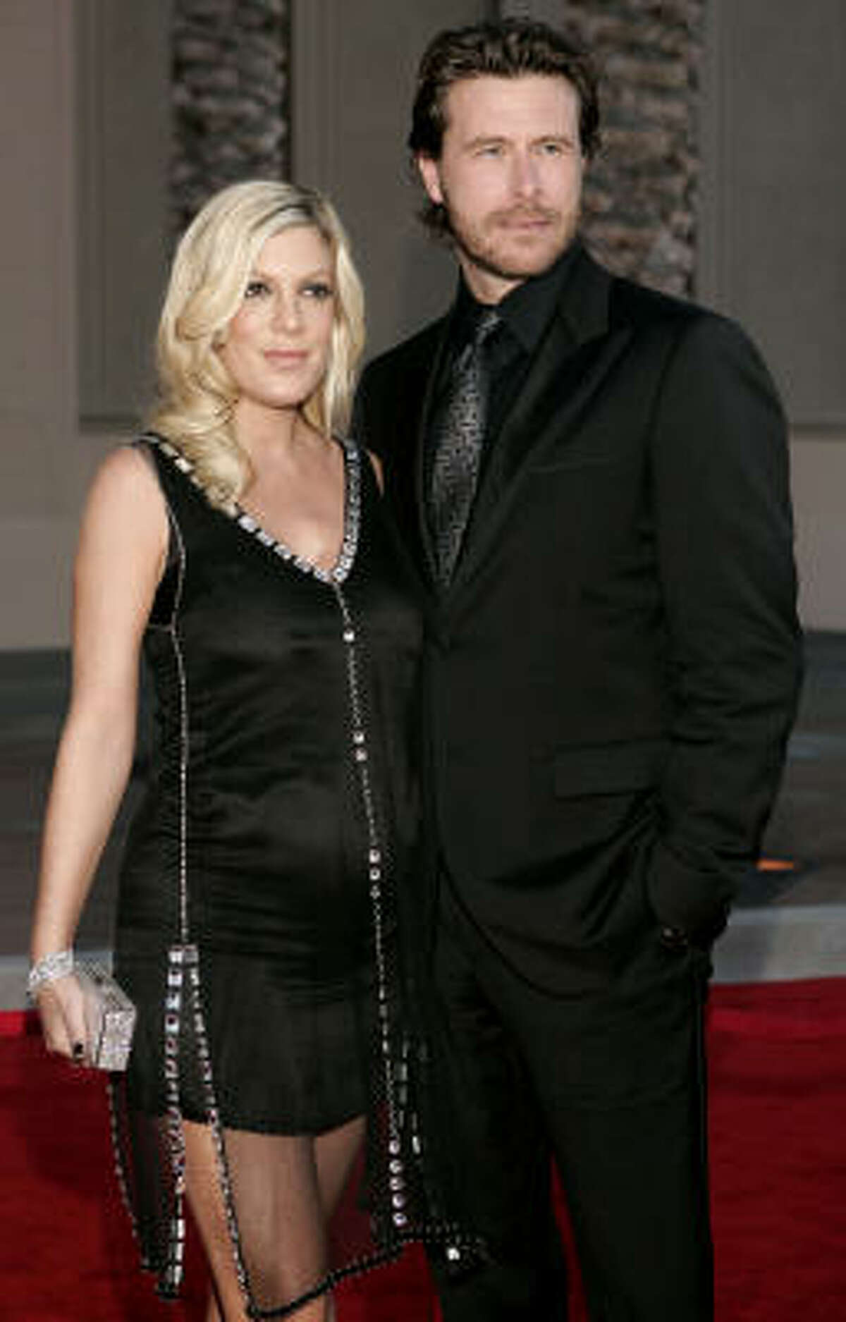 Tori Spelling and husband Dean McDermott arrive for the 2006 American Music Awards, Nov. 21, in Los Angeles.