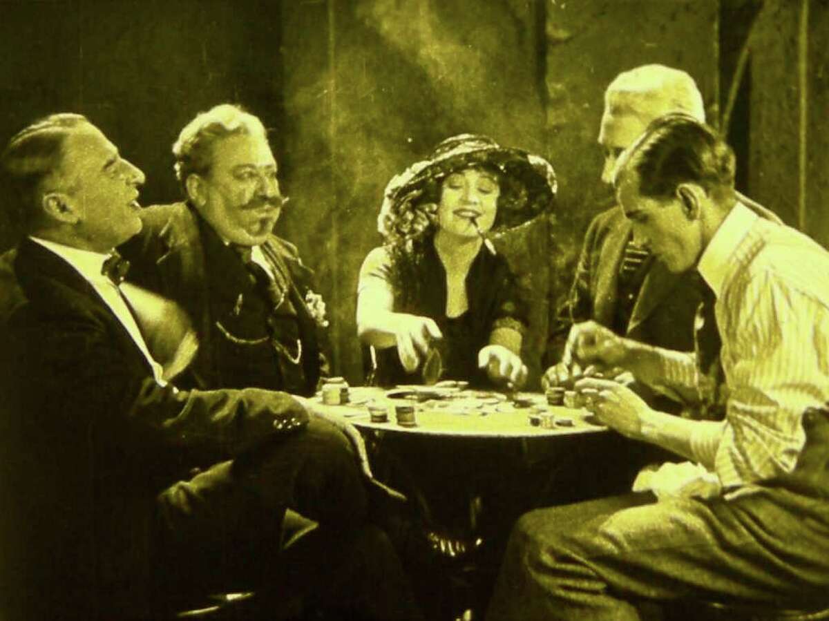 In this image released by the National Film Preservation Foundation, Betty Compson, center, is shown in a scene from the Alfred Hitchcock film, "The White Shadow." The New Zealand Film Archive and the National Film Preservation Foundation announced the discovery of the 1923 film, thought to be the earliest surviving feature by Alfred Hitchcock. (AP Photo/National Film Preservation Foundation)