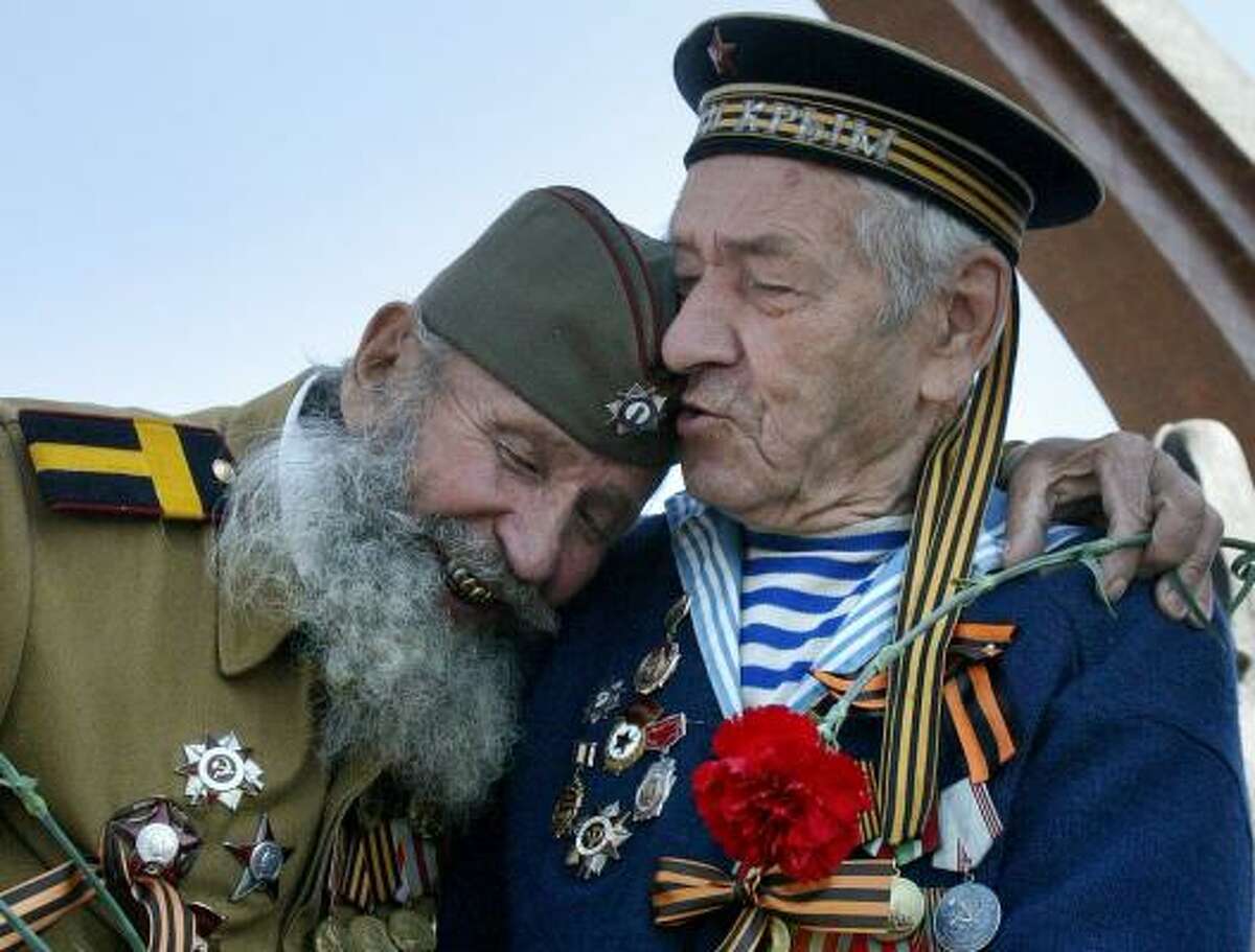 In Kyrgyzstan, two World War II veterans celebrate Victory Day in the city of Bishkek on Wednesday, marking the 62nd anniversary of the defeat of Germany in 1945.