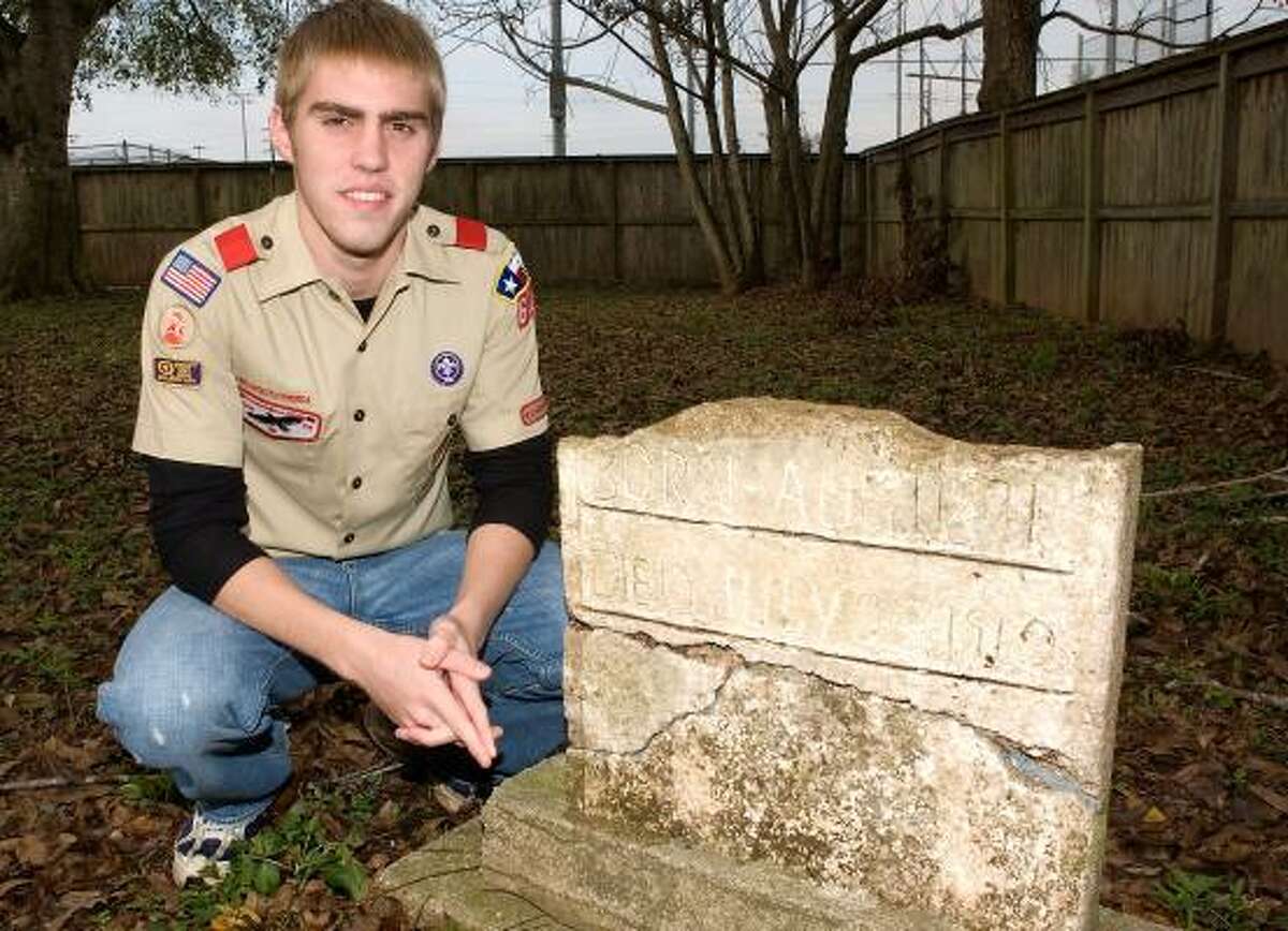 Crosby Johnson, in the small cemetery he is working to restore, hopes to re-sod the site, add a gate and clean the fence. "To meet Eagle Scout requirements, I've got to lead a team of Scouts in a project that helps and improves the community," the 16-year-old said.