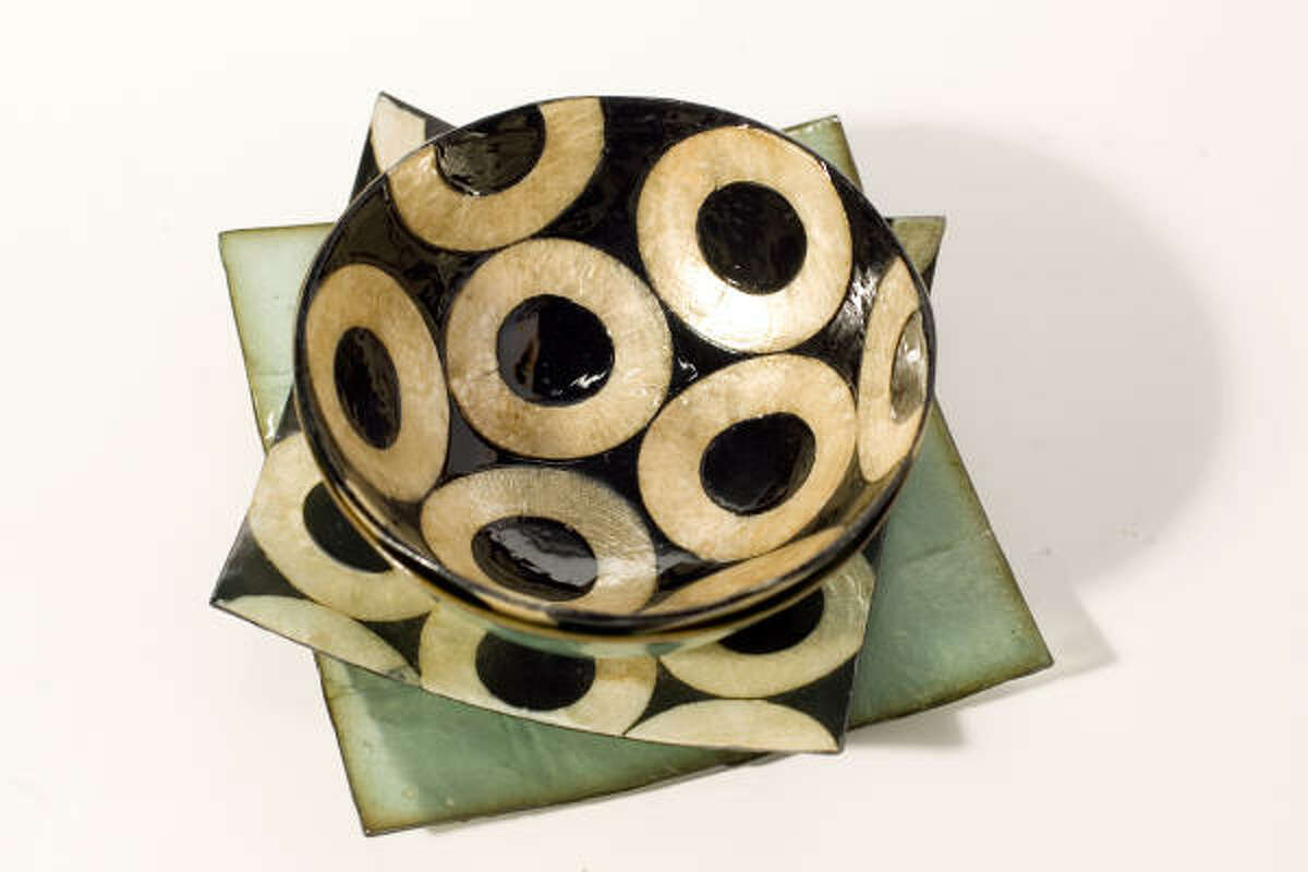 These 5-inch bowls and 5½-inch plates, $4-$5 at Z Gallerie, are made of Capiz shells.