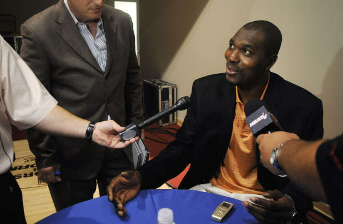 Former Rockets center Hakeem Olajuwon talks to reporters Friday. Olajuwon is among those in the class of 2008 being inducted into the Hall.