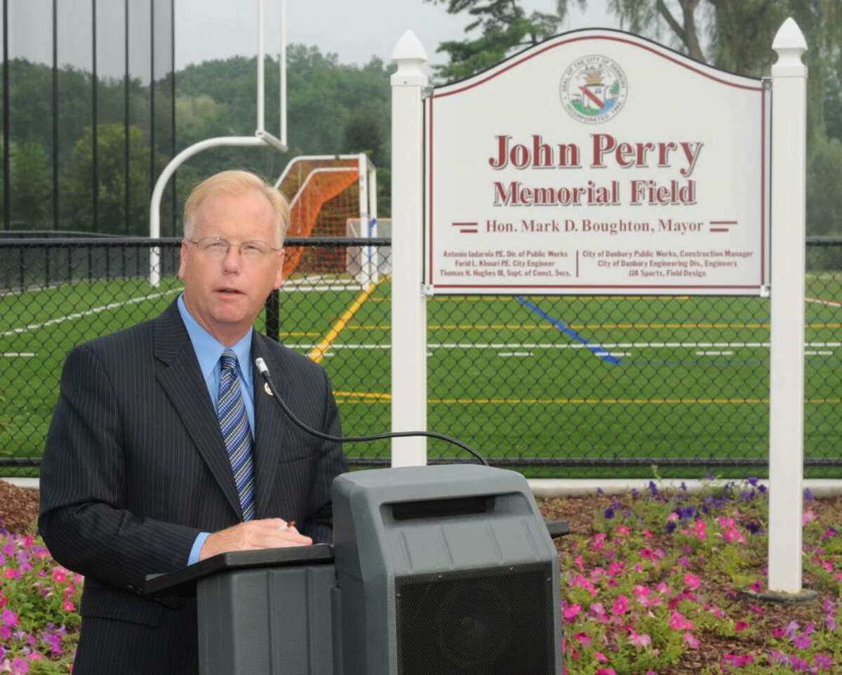 Mayor Mark Boughton speakes at the dedication of The John Perry Memorial Field at Rogers Park in Danbury on Wednesday.