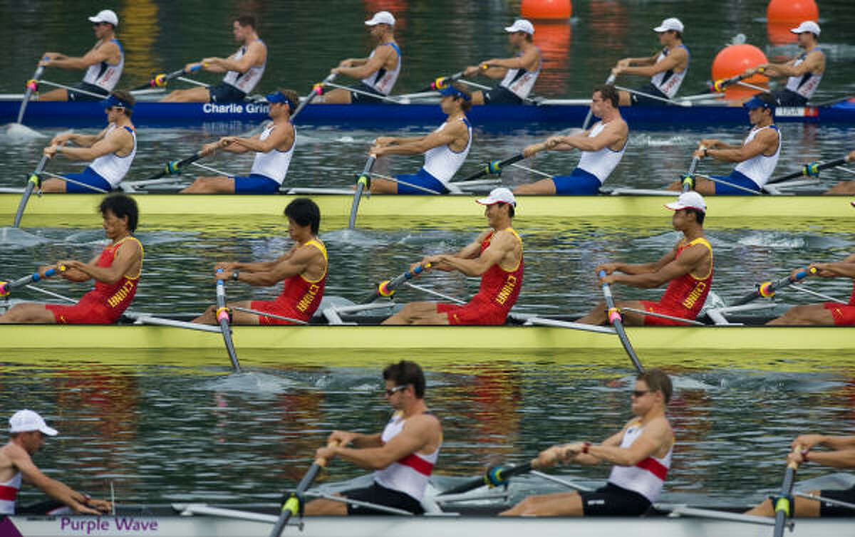 (From top to bottom): Men's eight rowing teams from the United States, Great Britain, China and Germany pull away from the starting line in a qualifying heat at the Shunyi Rowing-Canoeing Park.
