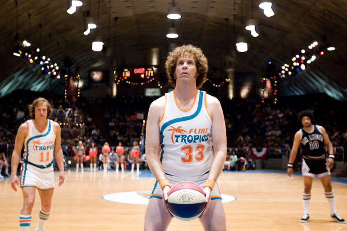 Woody Harrelson (left) stars as Ed Monix and Will Ferrell (center) stars as Jackie Moon in New Line Cinema's comedy, "Semi-Pro."