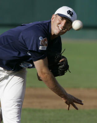 North Carolina second baseman Kyle Seager receives the ball from shortstop  Ryan Graepel (not shown) before turning a double play against LSU to end  the second inning of an NCAA College World