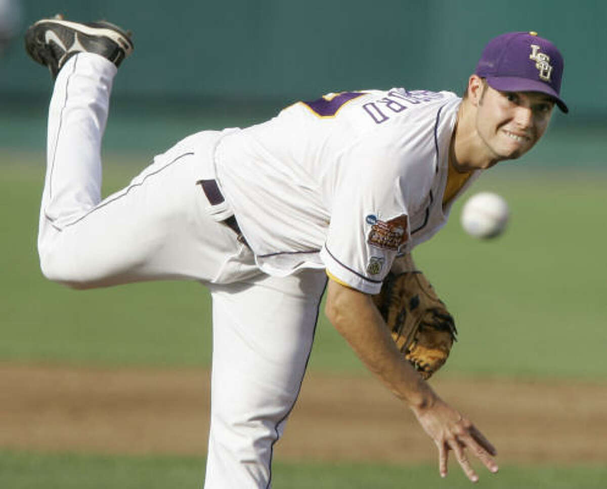 North Carolina second baseman Kyle Seager receives the ball from shortstop  Ryan Graepel (not shown) before turning a double play against LSU to end  the second inning of an NCAA College World