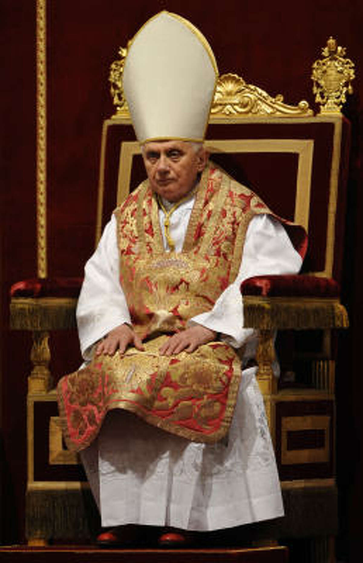 Pope Benedict XVI, wearing an embroidered fiddleback chasuble, presides over the Good Friday service in Saint Peter's basilica at the Vatican in March.