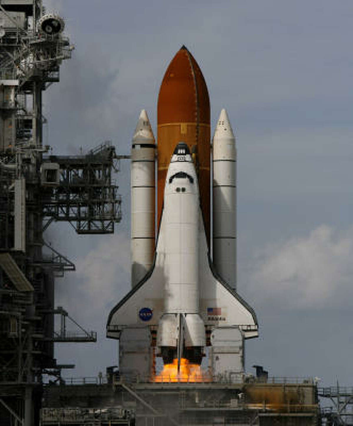 The Space Shuttle Atlantis launches from the Kennedy Space Center for mission STS-122.