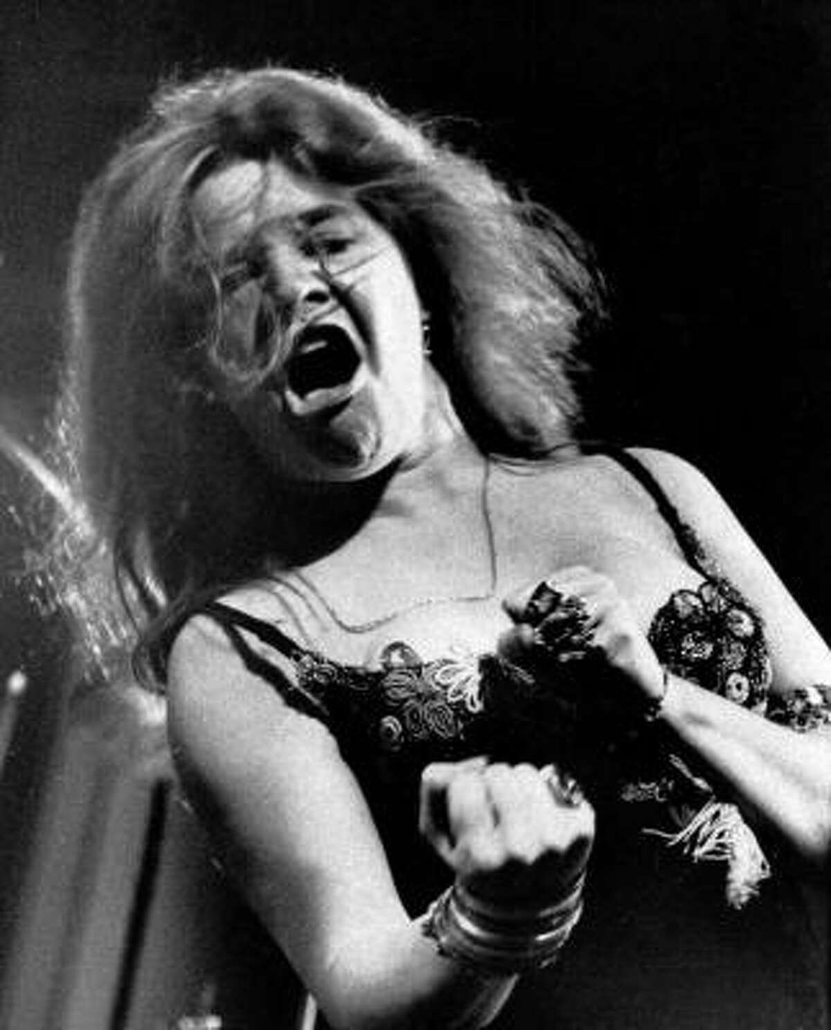 Blues/rock singer Janis Joplin performs at the Newport Folk Festival with her band Big Brother and the Holding Company on July 29, 1968. She died in 1970 at age 27.