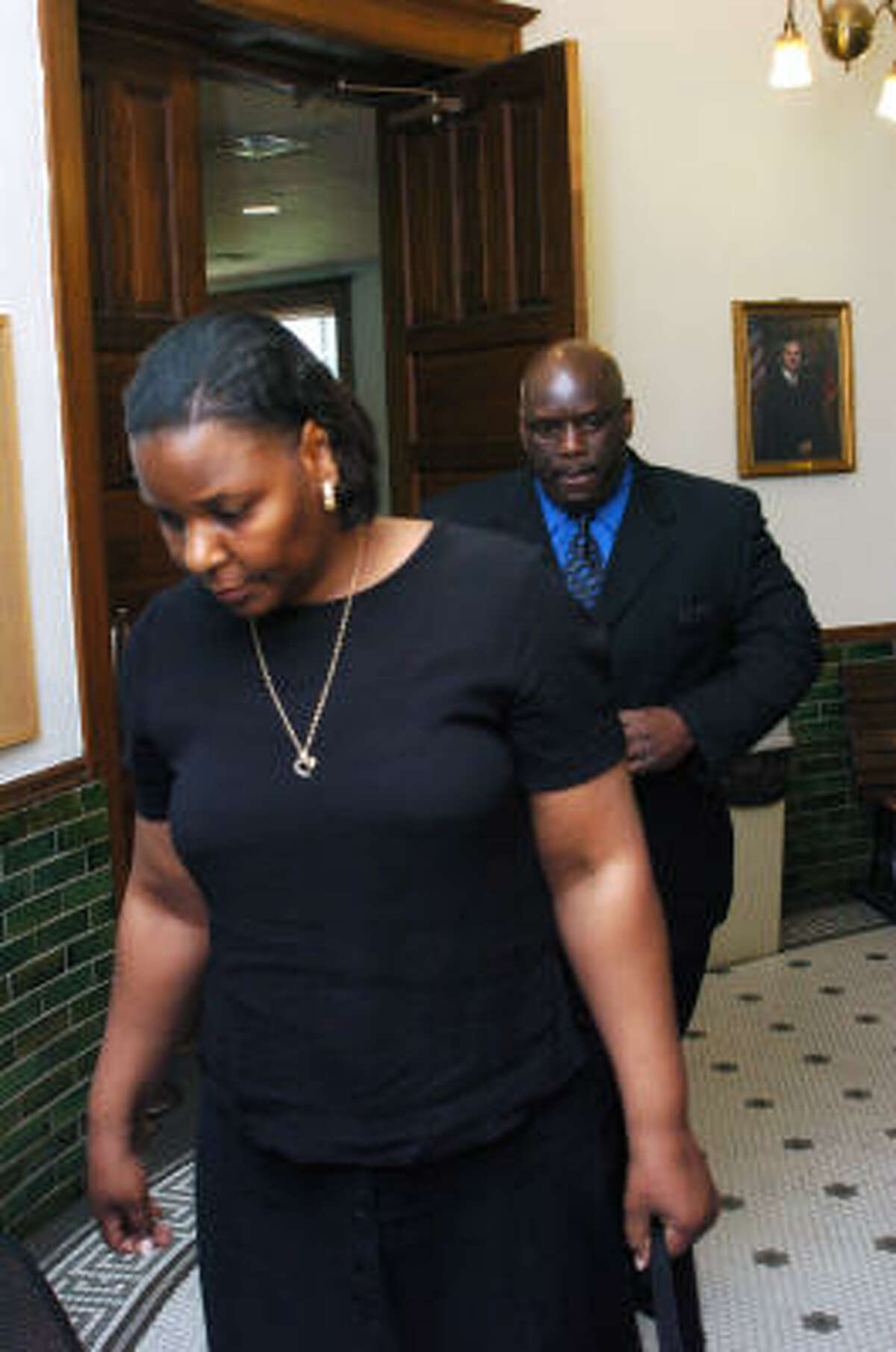Barbara and Tommy Baldwin exit the courtroom after receiving a guilty verdict Tuesday in Fort Bend County.
