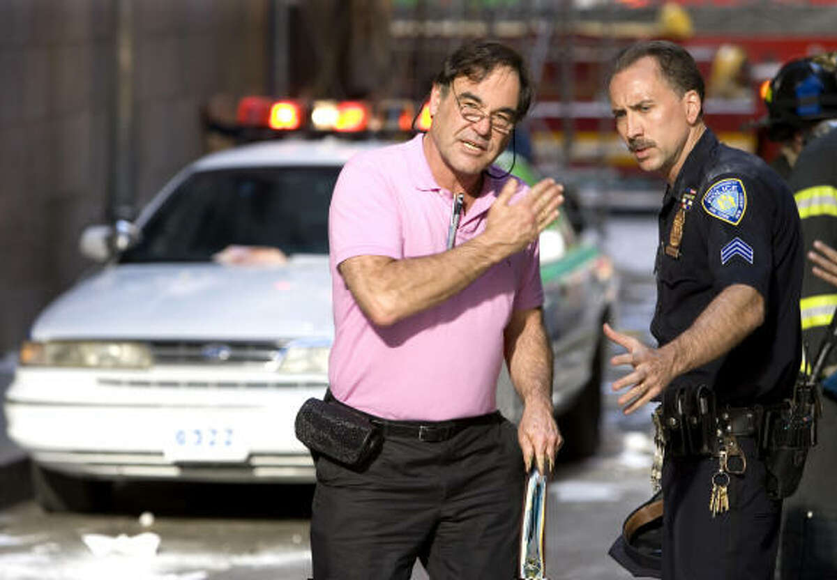 Oliver Stone directs Nicolas Cage in a scene for World Trade Center.
