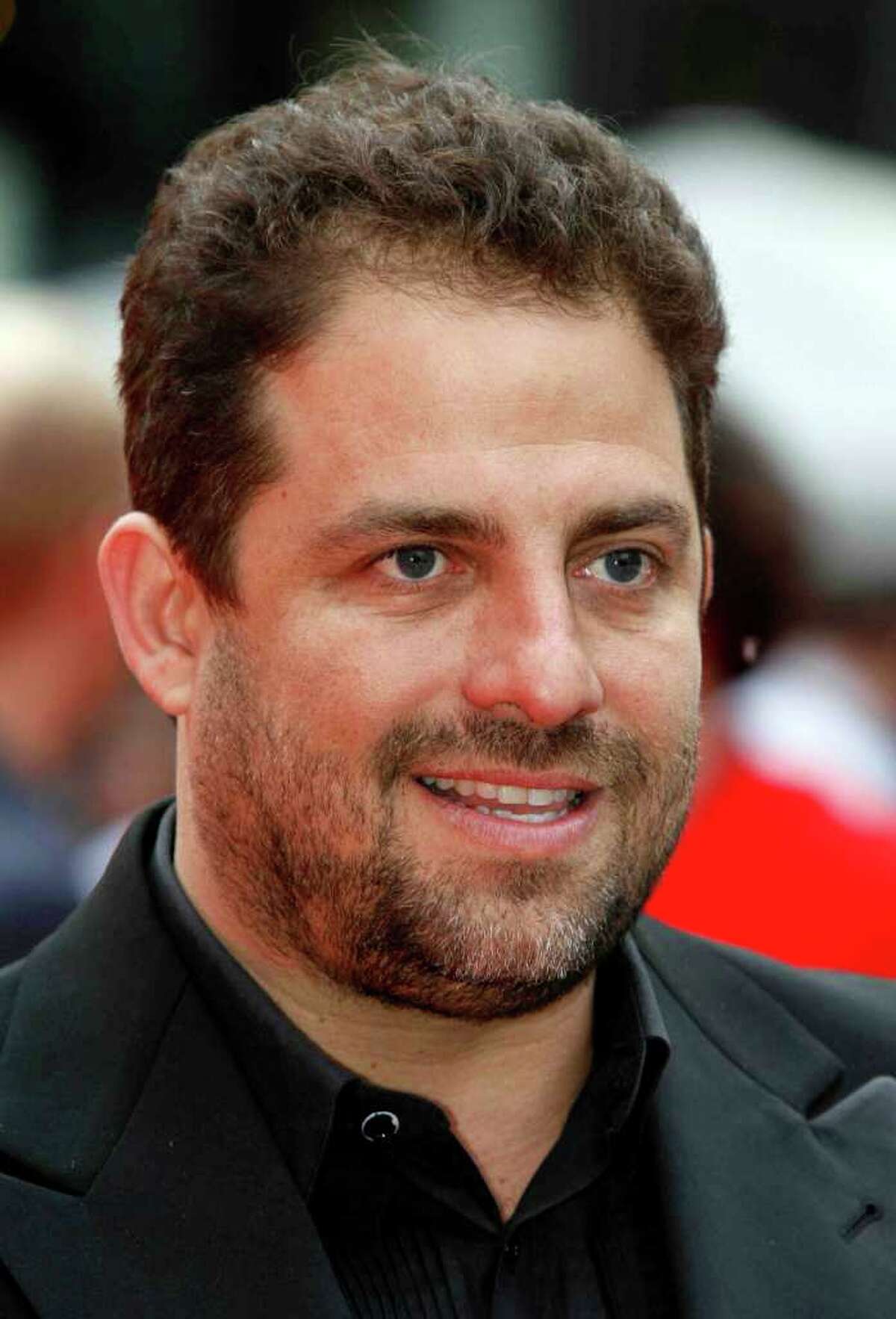 FILE - In this May 18, 2010 file photo, Brett Ratner poses for the photographers as he arrives for the European film premiere of the film 'Kites', in London, Tuesday, May 18, 2010. Ratner and Don Mischer will produce the 84th Academy Awards telecast, Academy of Motion Picture Arts and Sciences President Tom Sherak announced Thursday, Aug. 4, 2011. (AP Photo/Lefteris Pitarakis, File)