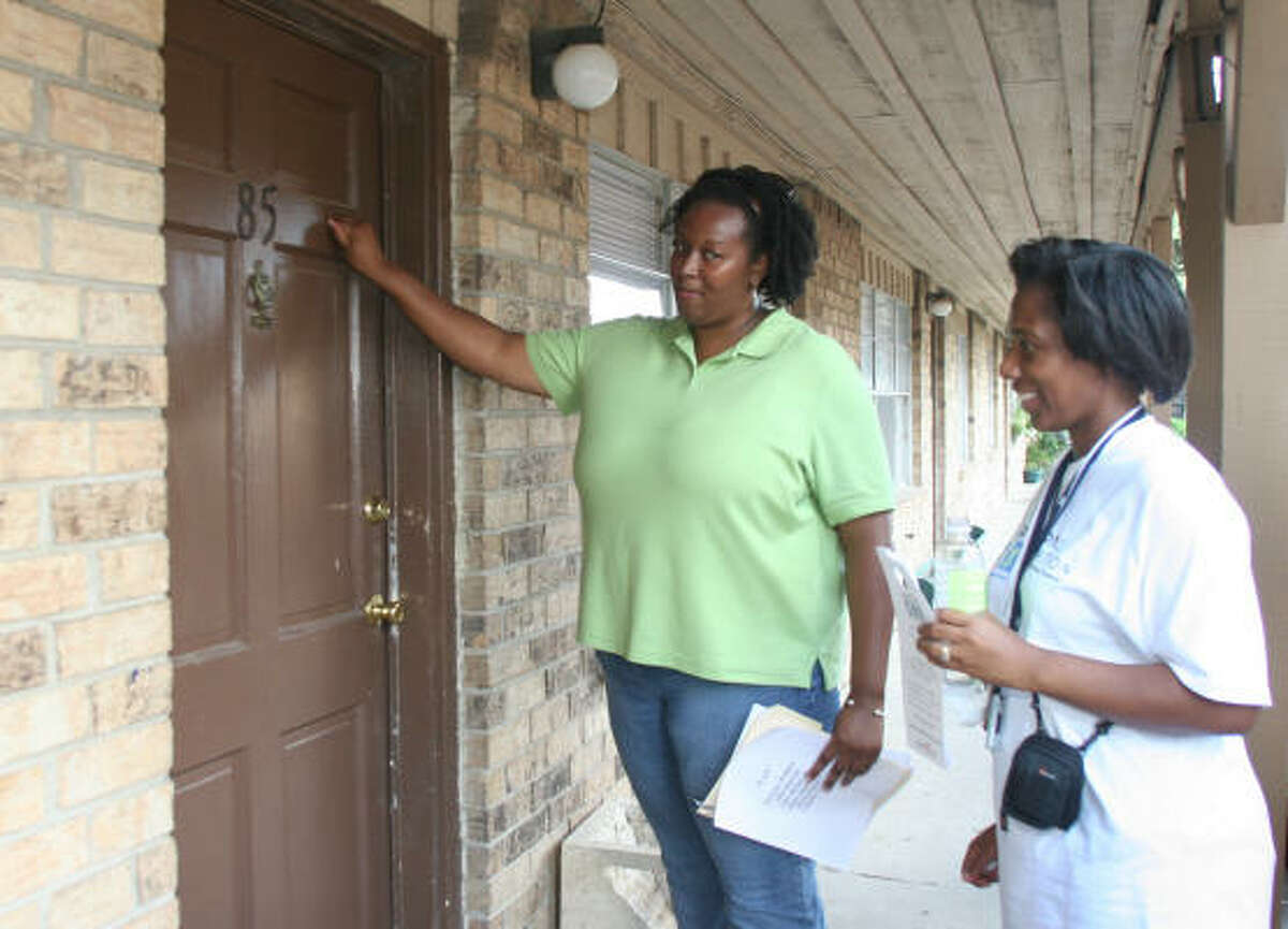 More than 1,400 volunteers, including Sharpstown teachers Alfee Herron, left, and Dee Wallace, went door to door to meet with dropouts during the third year of the Houston Independent School District's annual Reach Out to Dropouts walk.