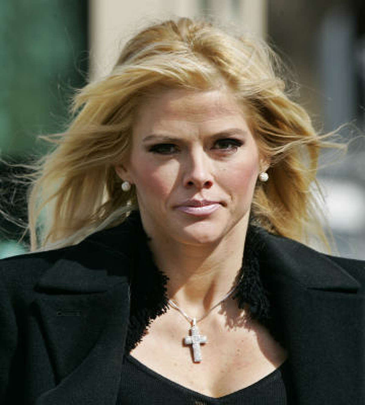 E. Pierce Marshall has been locked in a legal battle with his father's widow, Anna Nicole Smith, seen here leaving the U.S. Supreme Court in February, over her entitlement to the Marshall estate.