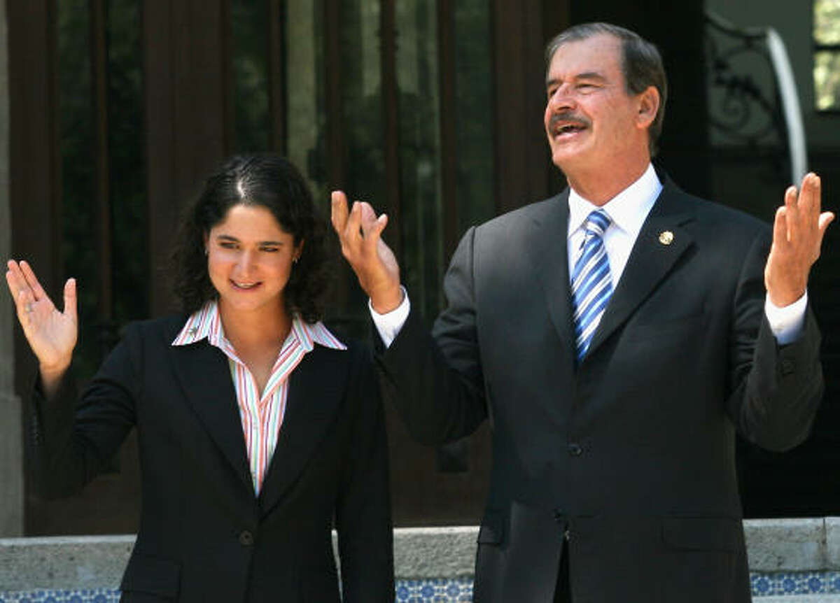 While his comments critical of the U.S. raised eyebrows here, many Mexicans agree with President Vicente Fox, shown Wednesday in Mexico City with national golf star Loreno Ochoa.