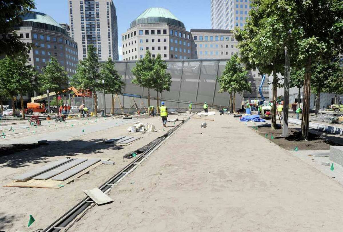 'You get back up': Freedom Tower rises from the void of ground zero