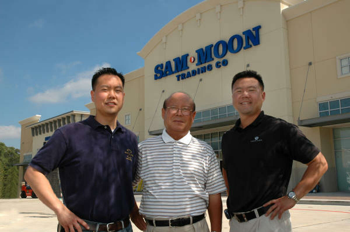 Daniel Moon, left, vice president and general counsel; David Moon, founder and CEO; and Sam Moon, president of Sam Moon Group, are opening their first Houston-area store near The Woodlands.