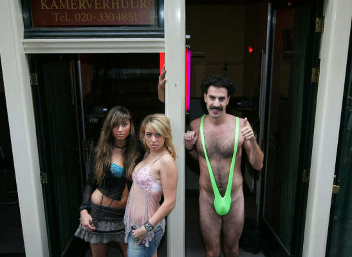 Comedian Sacha Baron Cohen turns heads in a bright-green thong.