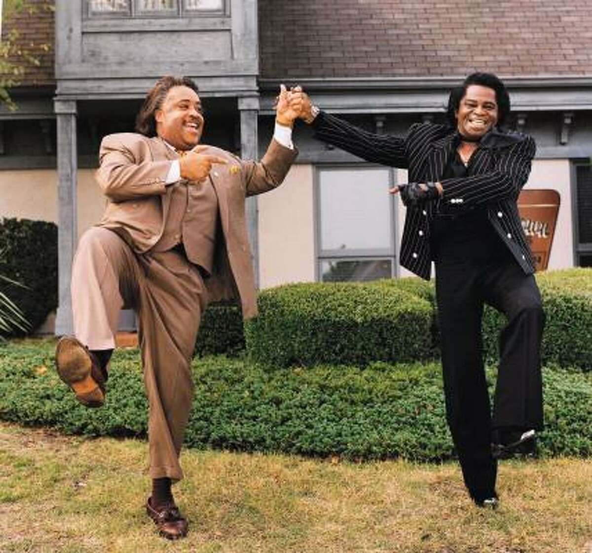The Rev. Al Sharpton, left, and entertainer James Brown kick up their legs in Augusta, Ga., in a photo for Esquire Magazine on Sept. 2,1998. ``He didn't inherit anything. He grew up fatherless, motherless, penniless and left people arguing over what they inherit from him.''