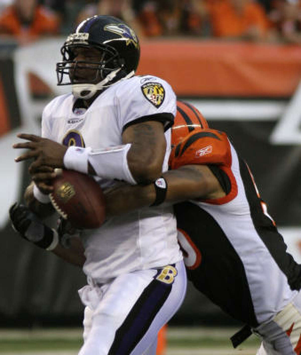 Quarterback Steve McNair of the Baltimore Ravens looks for a receiver