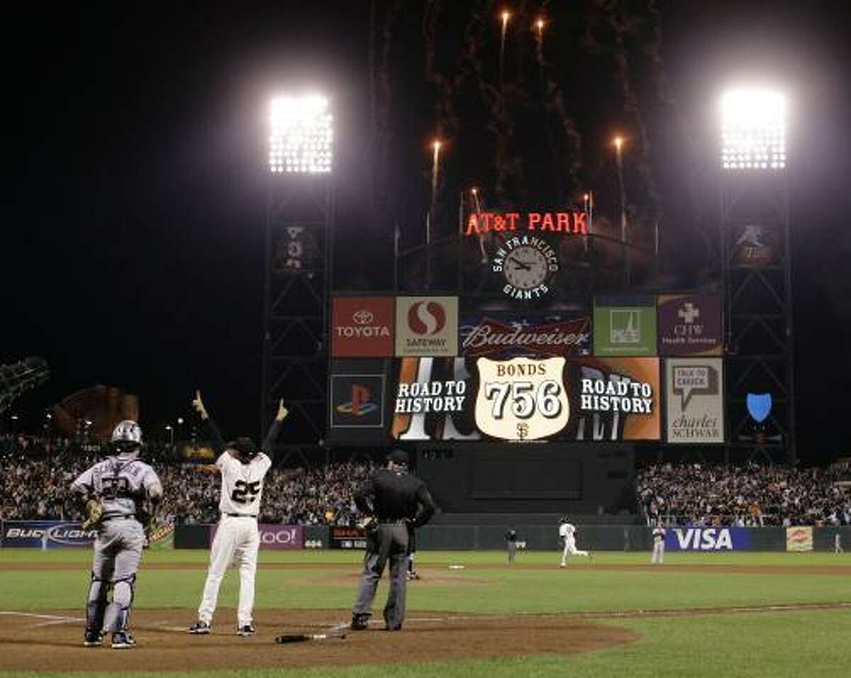 Barry Bonds of the San Francisco Giants celebrates after hitting