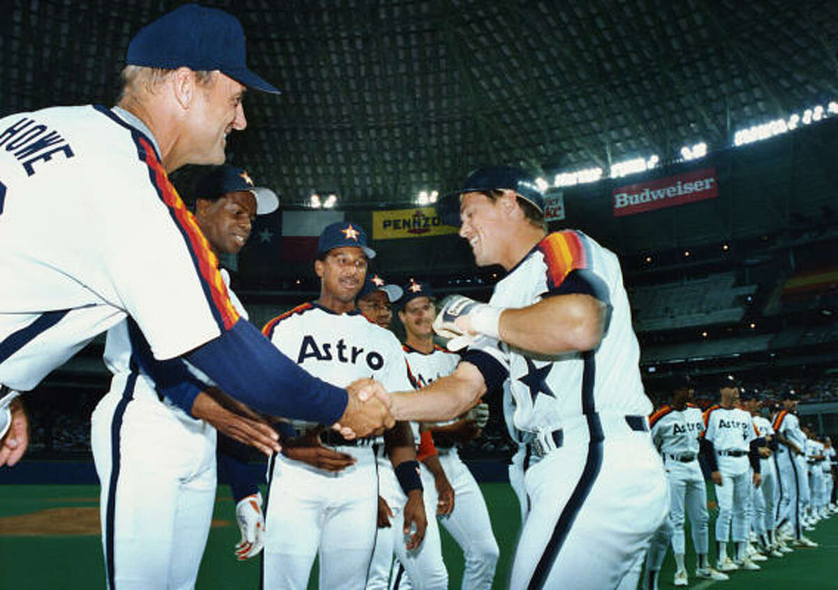 1989 -- Manager Art Howe shakes hands with the starting catcher Craig Biggio before the Astros opener.
